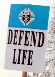 Tens of thousands of Knights of Columbus placards are handed out at the March For Life.