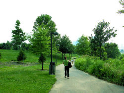The Louisville Waterfront Park exhibits rolling hills, spacious lawns and walking paths on Louisville's waterfront in the downtown area