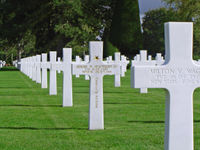 The grave of a recipient at the Normandy Cemetery and Memorial