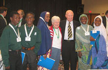 Nigerian exchange students meet Norman Borlaug (third from right) at the World Food seminar, 2003