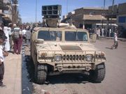 United States Army 312th PSYOP Company passes out leaflets and broadcasts messages in Al Kut, Iraq on May 2, 2003.