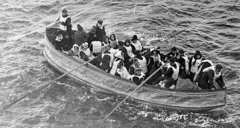 Survivors aboard Collapsible D, one of the Titanic's four collapsible lifeboats. Note the canvas sides.