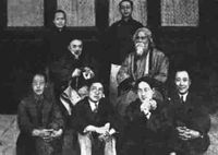 Tagore (center, at right) visits with Chinese academics at Tsinghua University in 1924.