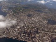 Downtown Seattle is bounded by Elliott Bay and the Alaskan Way Viaduct (lower left) and I-5 (from upper left to lower right)