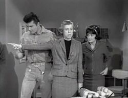 Tate (at right wearing a dark wig) as Janet Trego in a 1965 episode of The Beverly Hillbillies with Max Baer, Jr. and Nancy Kulp.