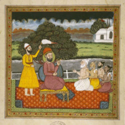 Guru Nanak Dev, the founder of Sikhism, with Hindu holy men.