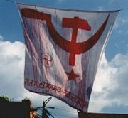 Samyukta Janamorcha Nepal electoral banner, 1994. The complete lack of any far-right connotations of the swastika in Asia is best illustrated by its use as a generic electoral symbol even by parties of the far-left.