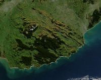 Forested areas show dark green in this satellite picture of the Catlins.