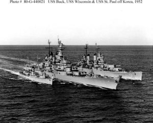 USS Buck (DD-761), USS Wisconsin (BB-64) and USS Saint Paul (CA-73) steam in close formation during operations off the Korean coast, 1952