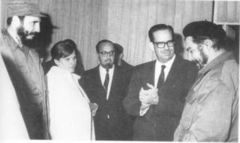 Guevara with members of his "reception committee" at Havana airport (Havana - 14 March 1965)