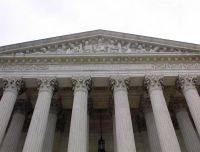 The words inscribed above the entrance to the U.S. Supreme Court are: "Equal justice under law"