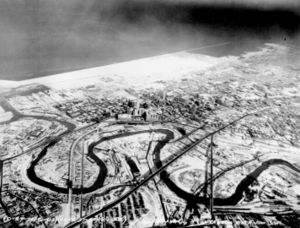 Aerial view of downtown Cleveland in December 1937. The Cuyahoga River winds through the Flats.