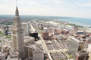 The Terminal Tower complex, with the Warehouse District, the Cuyahoga River, and Lake Erie in the background.