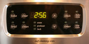 Digital clock display in an oven.