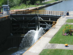 Upstream view of the downstream lock (Lock 32, Pittsford, NY) showing some water gushing and making some nice splashes.