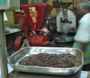 Coffee being ground at a coffee shop in Chennai, India