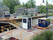 The modern Erie Canal has 34 locks, which are painted with the blue and gold colors of the New York State Canal System's parent authority, the Thruway Authority.