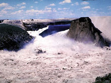 The reservoir emptying through the failed Teton Dam