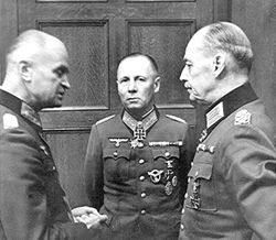 Field Marshal Erwin Rommel (centre) discusses the expected Allied invasion of France with Colonel General Johannes Blaskowitz and Field Marshal Gerd von Rundstedt.