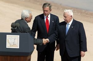 Bush, President of the Palestinian Authority Mahmoud Abbas, and former Israeli Prime Minister Ariel Sharon meet at the Red Sea Summit in Aqaba, Jordan on June 4, 2003.