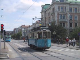 Gothenburg's popular trams travel the wide streets (the one shown in the foreground is a vintage tram used mostly by tourists).