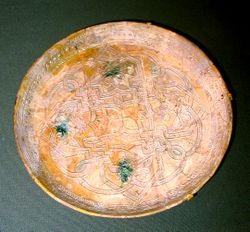 This earthenware dish was made in 9th century Iraq. It is housed in the Smithsonian Institute in Washington, D.C.