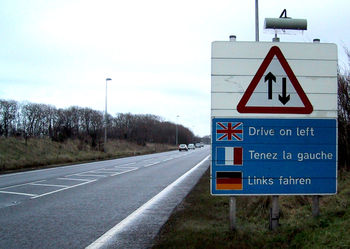One of many road signs in the English county of Kent placed on the right hand side of the road
