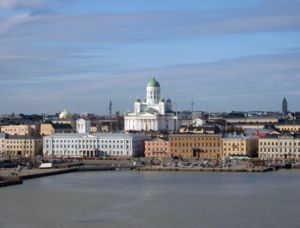 A view of the Market Square, Supreme Court of Finland, Swedish Embassy, Helsinki City Hall and Helsinki Cathedral in the background. The Kallio church tower is also visible in the background on the far right. 