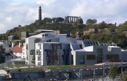 The Scottish Parliament, with Calton Hill in the background.