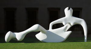 Reclining Figure (1951) outside the Fitzwilliam Museum, Cambridge, is characteristic of Moore's sculptures, with an abstract female figure intercut with voids. There are several bronze versions of this sculpture, but this one is made from painted plaster.