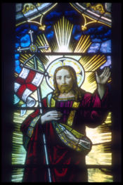 Stained glass from Rochester Cathedral, Kent, England. Note the use of the Flag of England in this work.