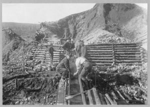Alaskan prospectors washing gold, 1916.