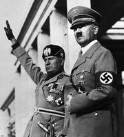 Benito Mussolini giving the Roman salute standing next to Adolf Hitler