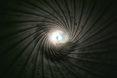 Interior of the barrel of a 75 mm World War I artillery piece.