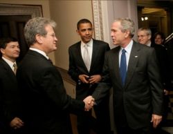 U.S. Senate bill sponsors Tom Coburn (R-OK) and Barack Obama greet President Bush at the signing ceremony of the Federal Funding Accountability and Transparency Act of 2006.