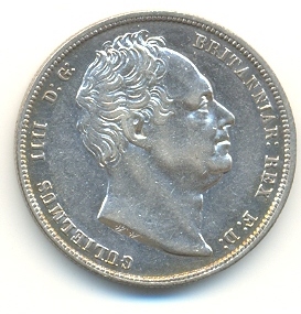 Half-Crown of William IV, 1836. The inscription reads GULIELMUS IIII D(ei) G(ratia) BRITANNIAR REX F(idei) D(efensor) (William IV by the Grace of God King of the Britons, Defender of the Faith)