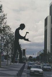 "Hammering Man" in front of the Messeturm skyscraper