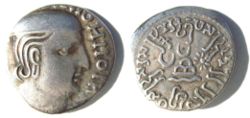 Coin of the Western Kshatrapa ruler Bhratadaman (278-295), with corrupted Greek legend on the obverse and Brahmi legend on the reverse.