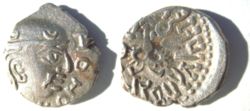 A silver coin of the Gupta King Kumara Gupta I (414-455) influenced by Indo-Greek coinage through the Western Kshatrapas, with profile of the ruler and obverse legend in pseudo Greek (succession of letters H and O), and reverse legend is in Brahmi.