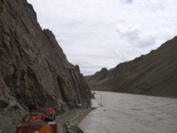 A flooded Indus river inundates the Srinagar-Kargil-Leh highway.