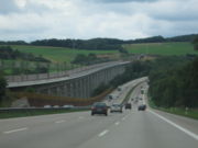 Germany hosts a lot of the central European traffic corridors — Bundesautobahn 3 next to the Cologne-Frankfurt high-speed rail line