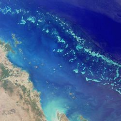 Satellite image of part of the Great Barrier Reef adjacent to the Queensland coastal areas of Proserpine and Mackay.