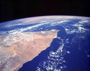 The Horn of Africa as seen from the NASA Space Shuttle, in May of 1993. The orange and tan colors in this image indicate a largely arid to semiarid climate.