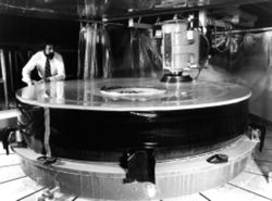 Polishing of Hubble's primary mirror begins at Perkin-Elmer corporation, Danbury, Connecticut, May 1979.  The engineer pictured is Dr. Martin Yellin, an optical engineer working for Perkin-Elmer on the project.
