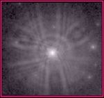 An extract from a WF/PC image shows the light from a star spread over a wide area instead of being concentrated on a few pixels.