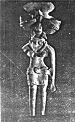 A statuette of a female figure.
