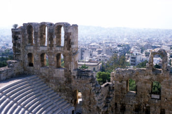 View of central Athens from its  acropolis. In the foreground: The Theatre of Herodes Atticus