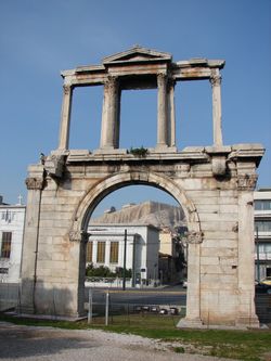 Arch of Hadrian in central Athens, with the Acropolis seen in the background.