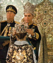 Mohammad Reza Pahlavi, the last Shah of the Iranian Monarchy, crowning Farah Pahlavi as Empress of Iran.