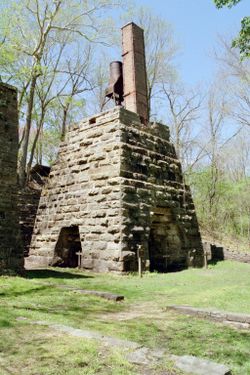 This blast furnace in eastern Missouri consumed up to 11,000 tons of ore and 16,000 cords (58,000 m³) of wood annually from 1827 to 1891.